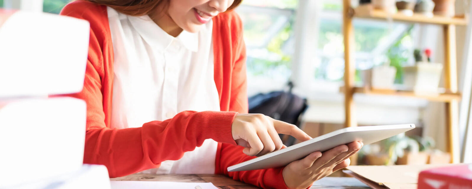 Website creation for small businesses A female small business owner looks at the fantastic website I made for her.