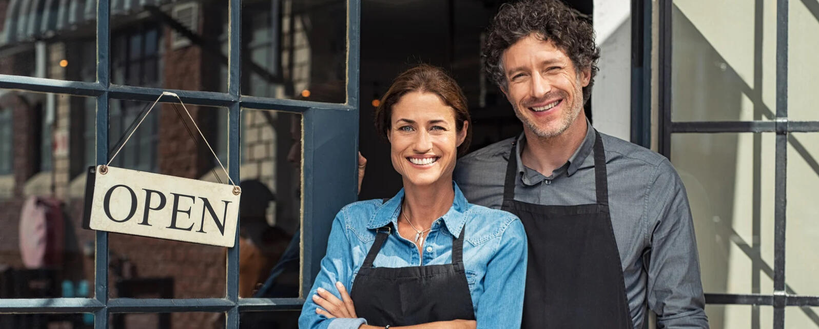 Website creation for small businesses A female small business owner looks at the fantastic website I made for her.